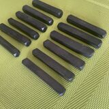 Set of 12 vintage ebony knife rests