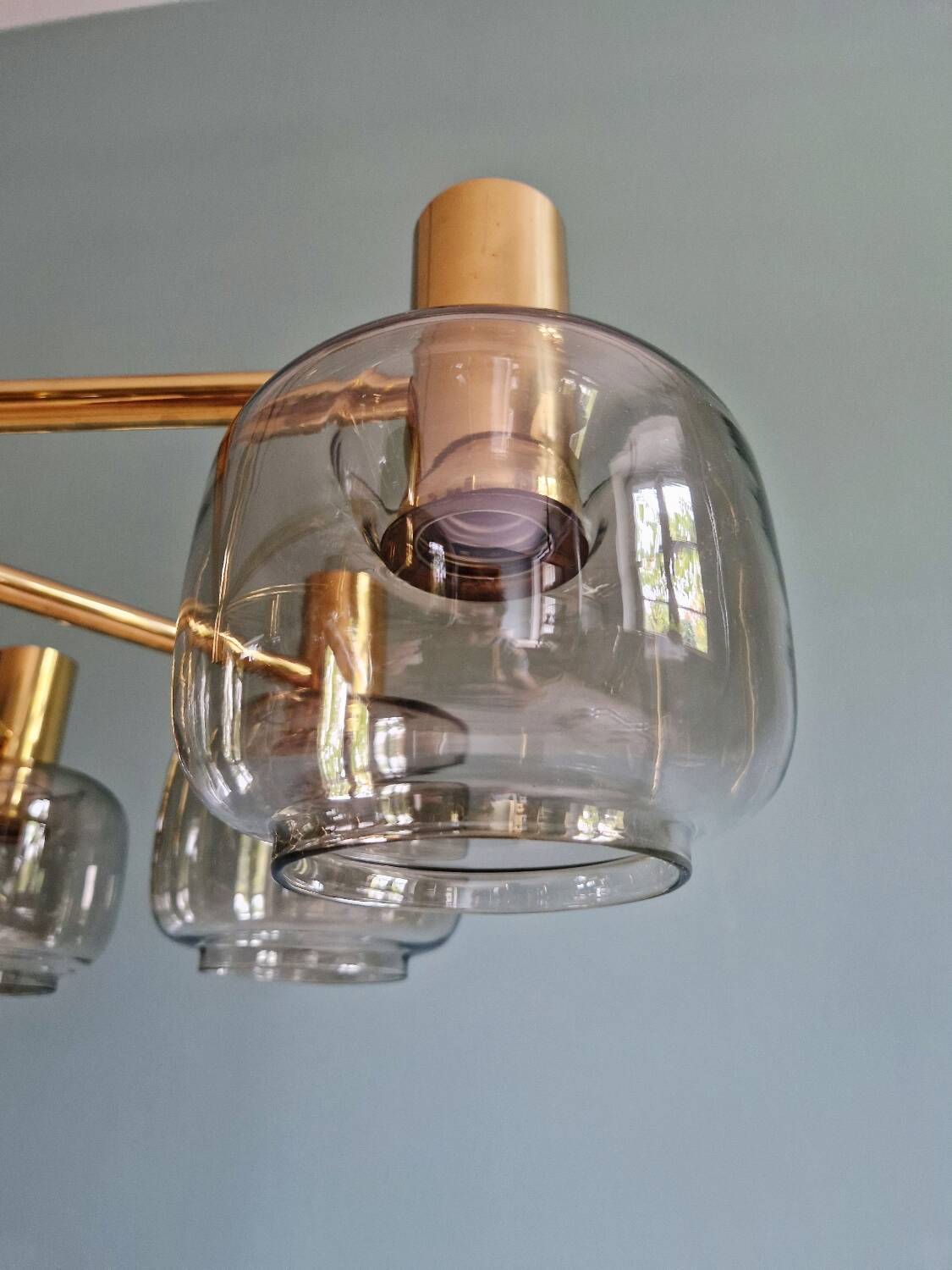 Large designer chandelier in brass and smoked glass globes, 1970s