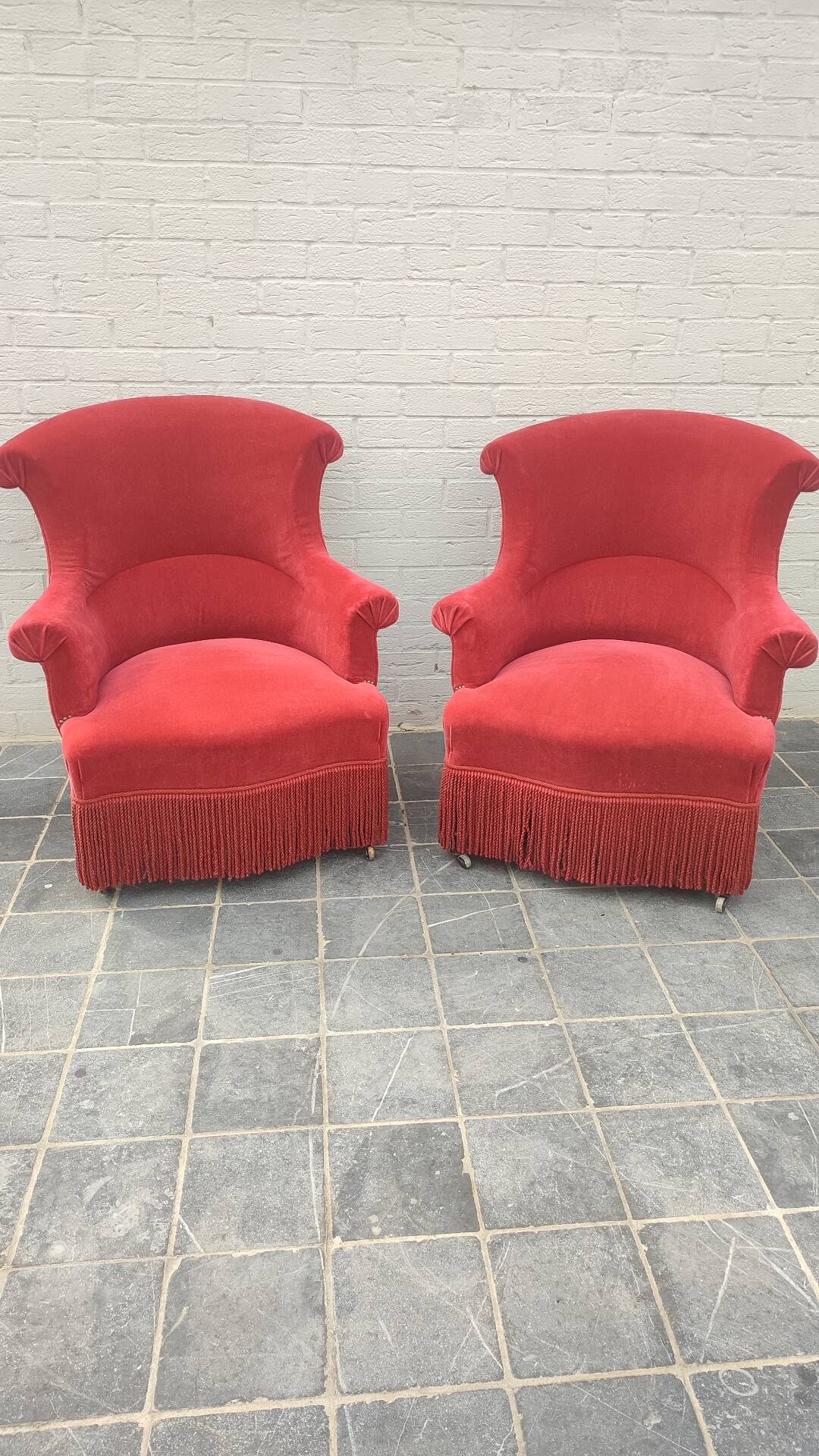 Pair of fringed crapaud armchairs