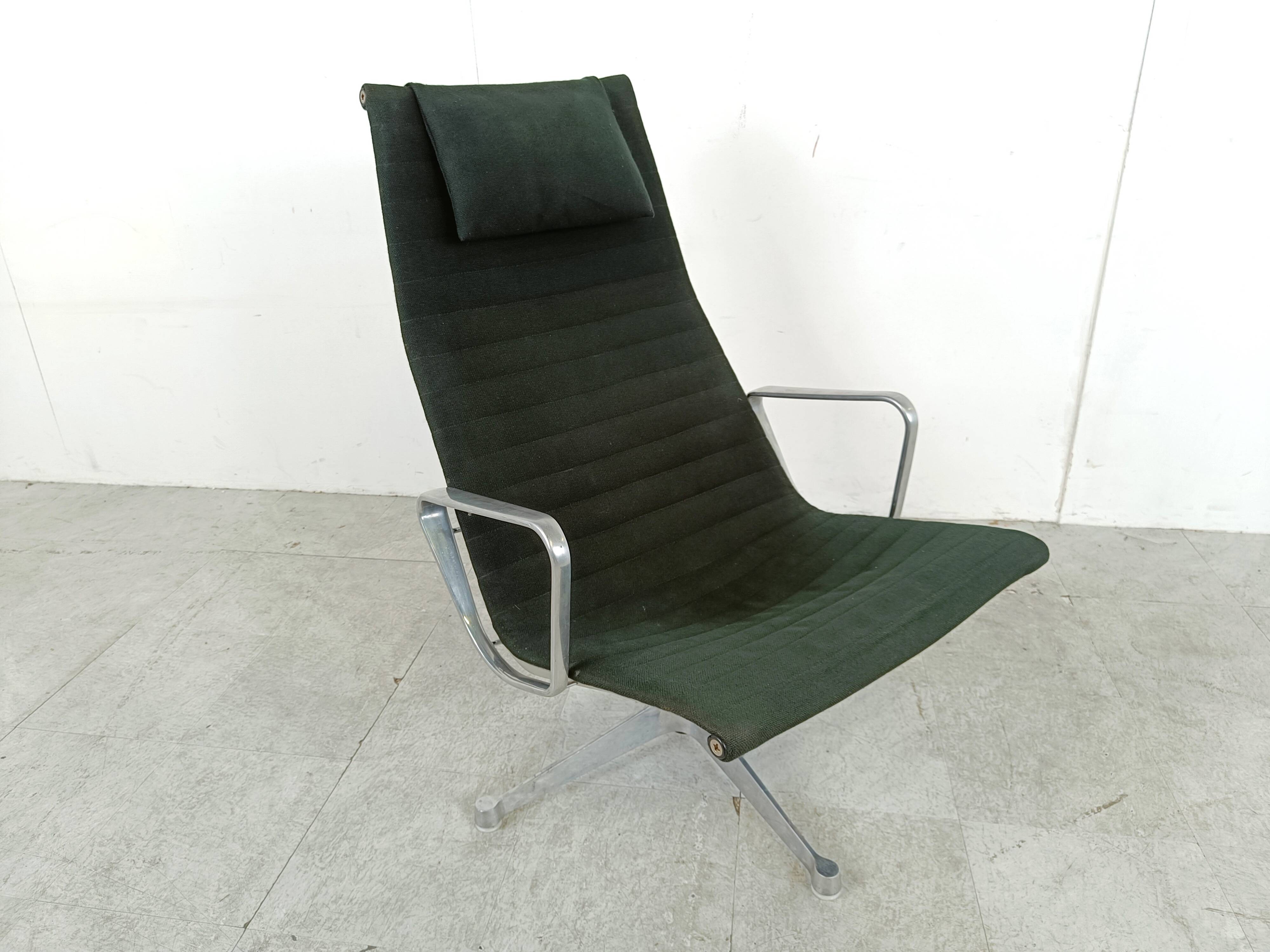 Charles & Ray Eames EA124 Lounge chair in black fabric, 1970s
