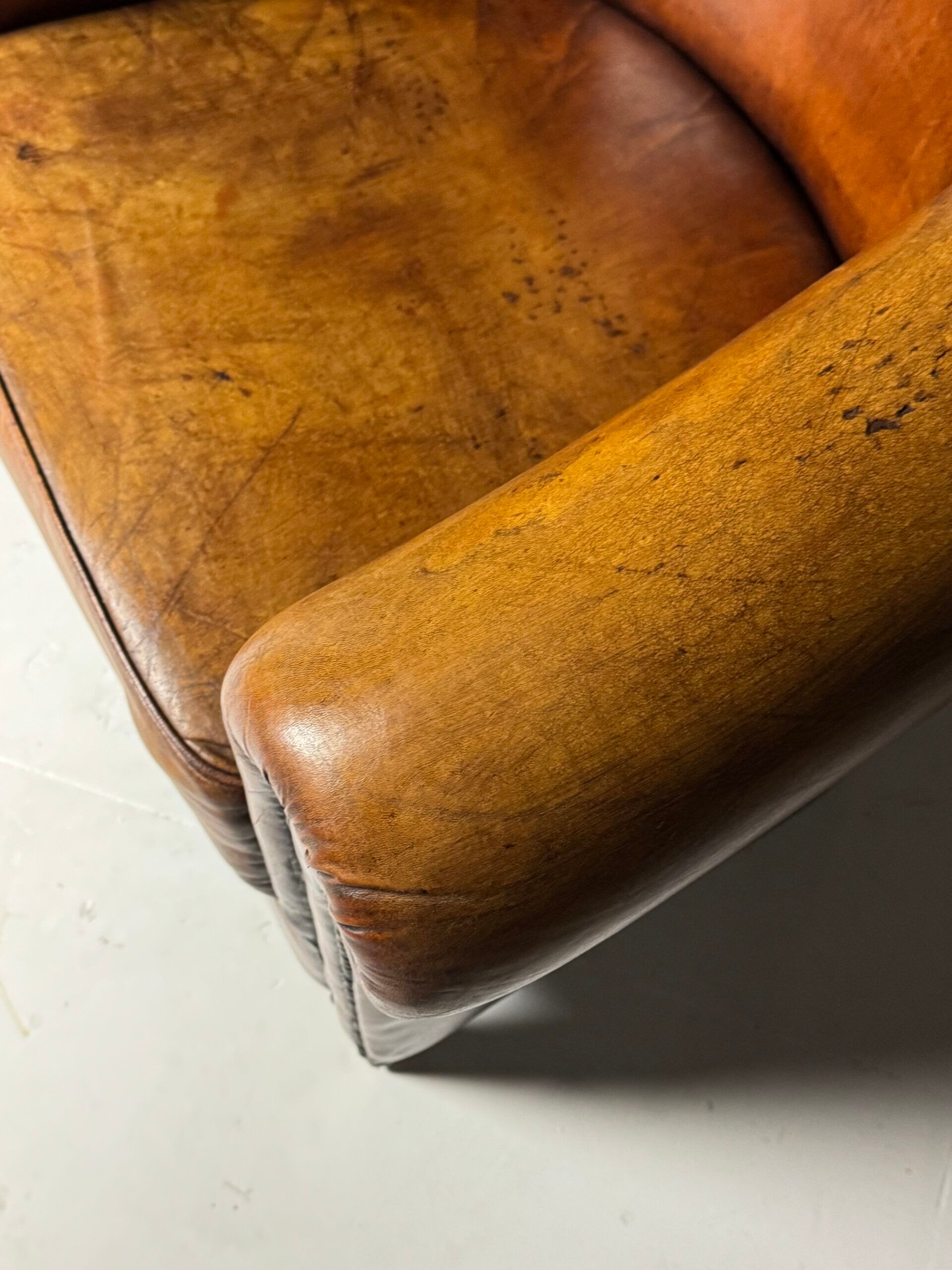 Fauteuil club en peau de mouton 2x classique