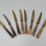 Suite of eight horn knives by stahl bronce xxe