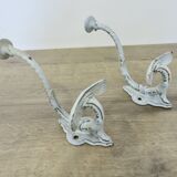 Pair of enameled cast iron coat hooks, 19th