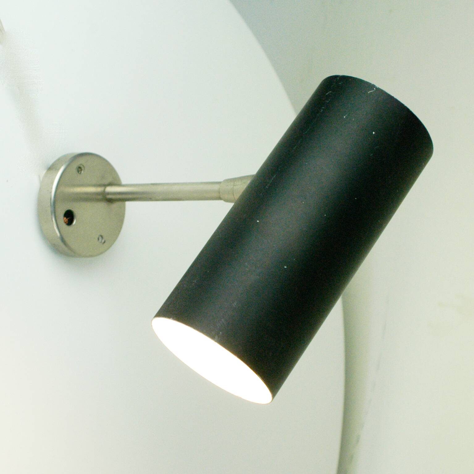 Austrian black cylindrical wall light by J.T. Kalmar, Vienna, mid-century.