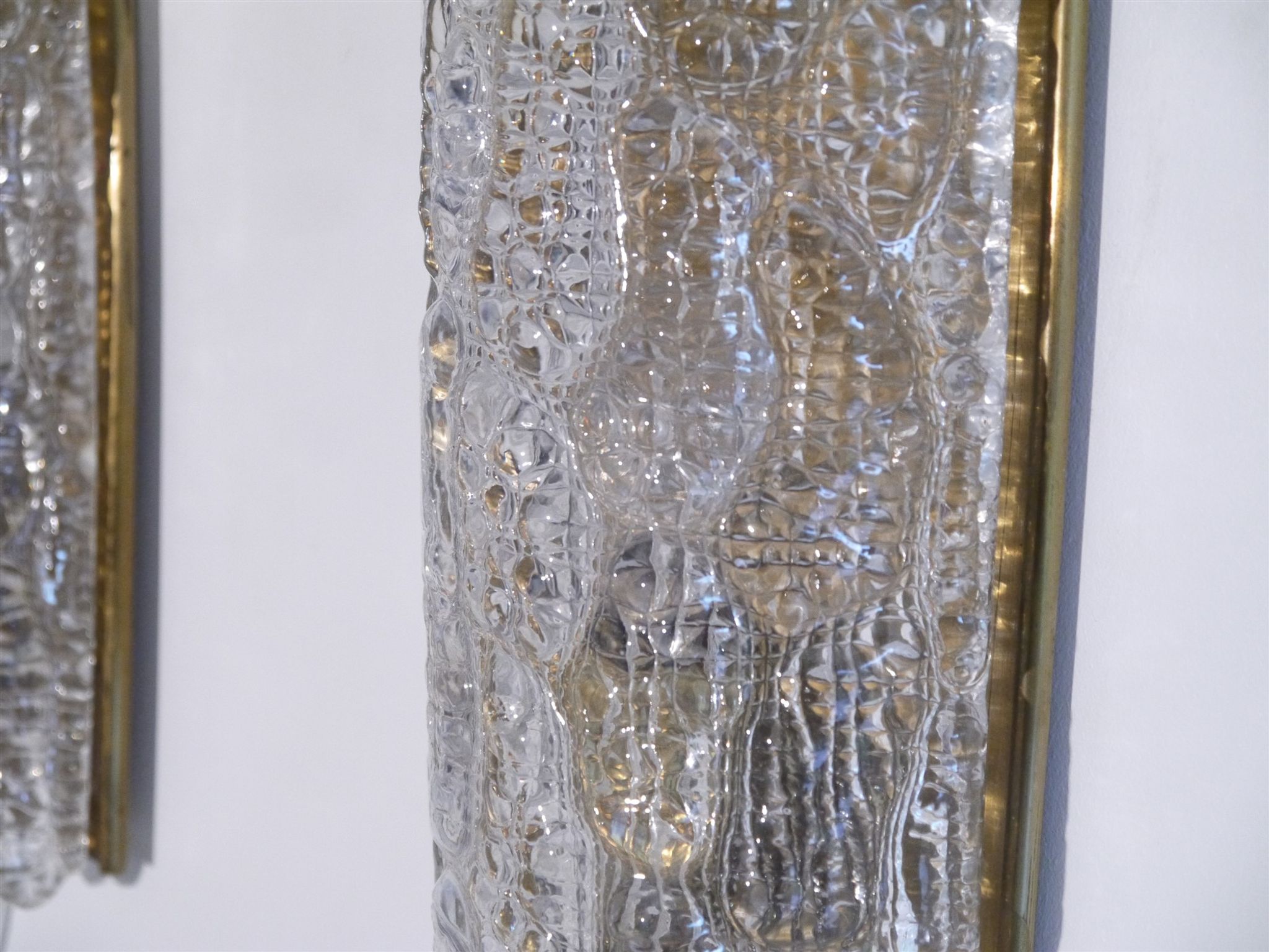 Pair of brass and crystal appliques by Carl Fagerlund for Orrefors