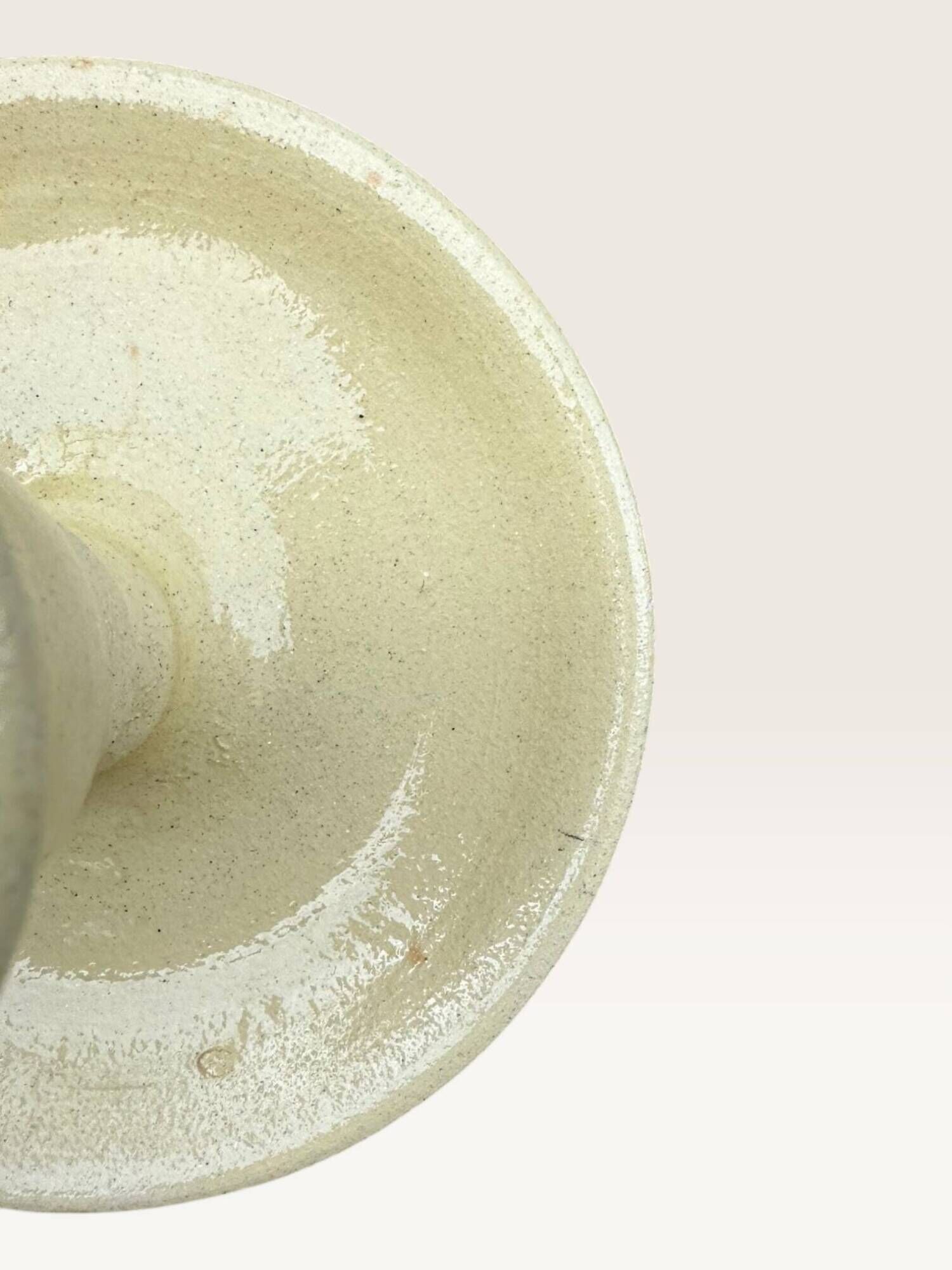 Cave rat candle holder in off-white ceramic
