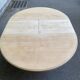 Extendable round dining table with central art deco leg, renovated in raw wood