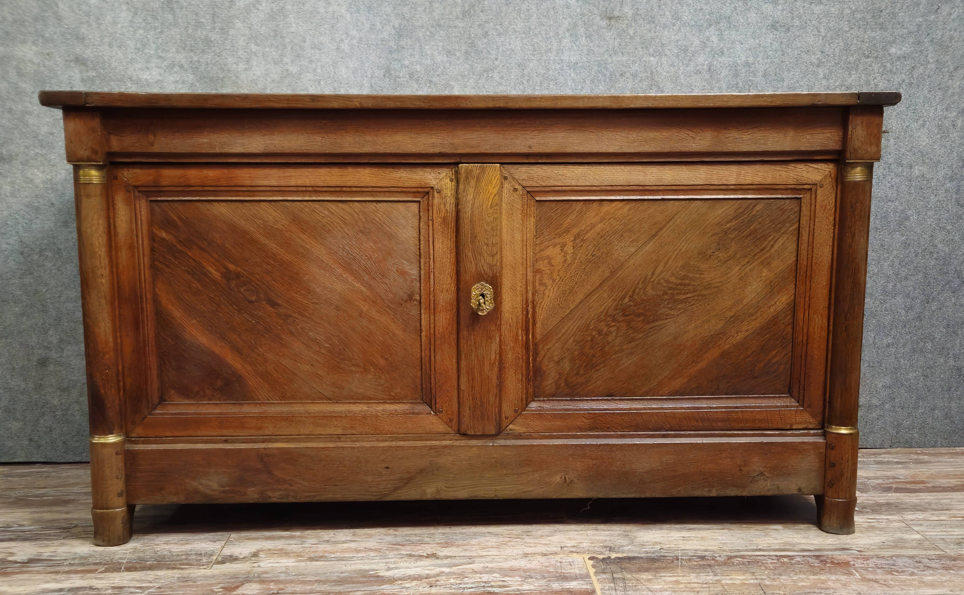 Buffet from the Empire period in solid oak, transformed on the back into a counter.