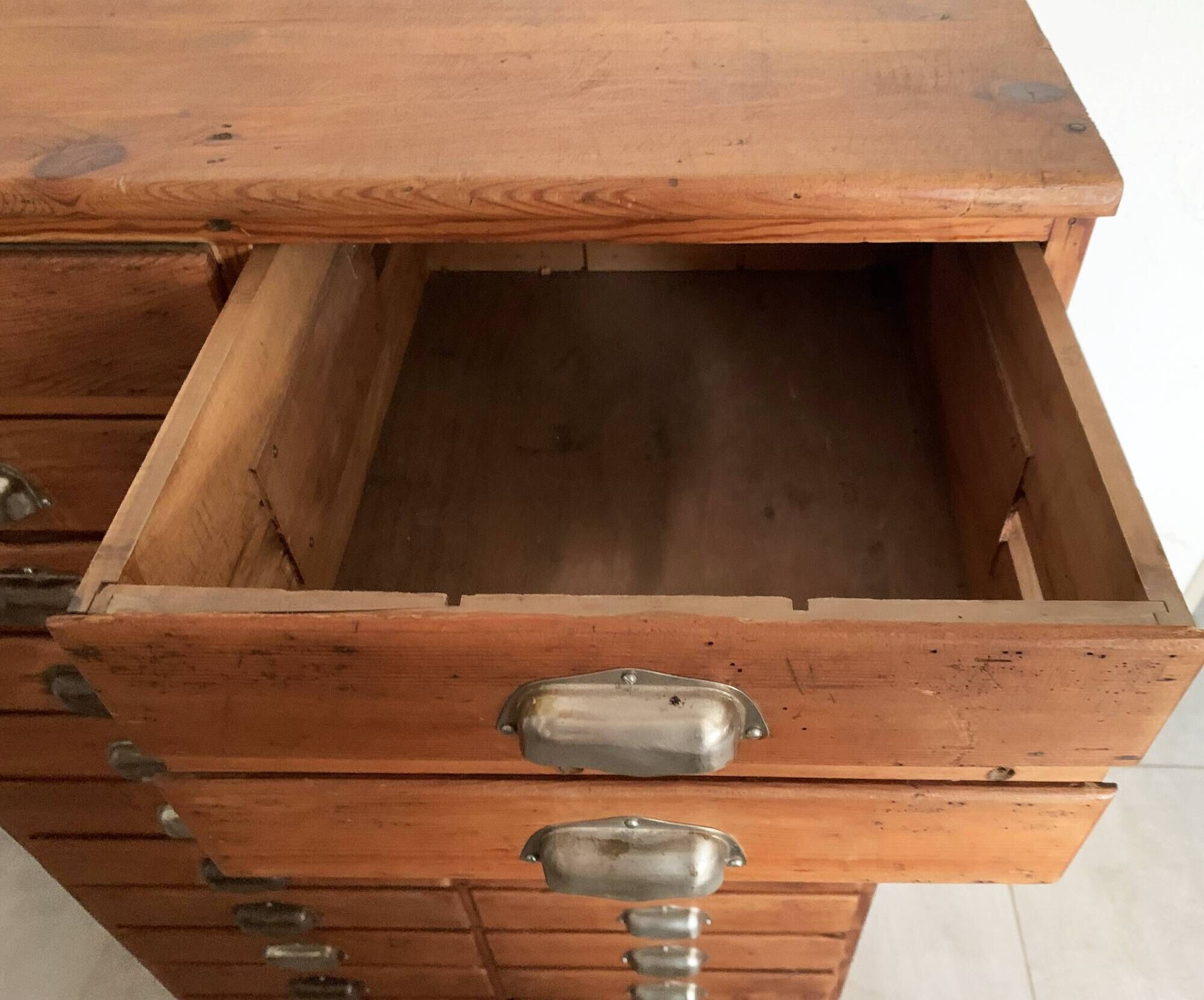 Old apothecary trade furniture in vintage wood 24 drawers.