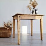 Antique farmhouse table in raw wood