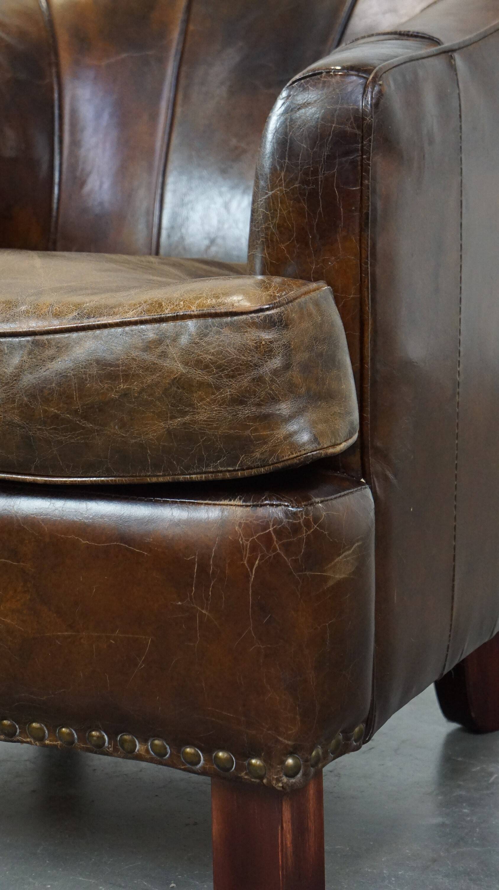 Stylish armchair with a unique design and beautiful finish, made of leather
