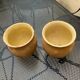Pair of terracotta and ceramic pots