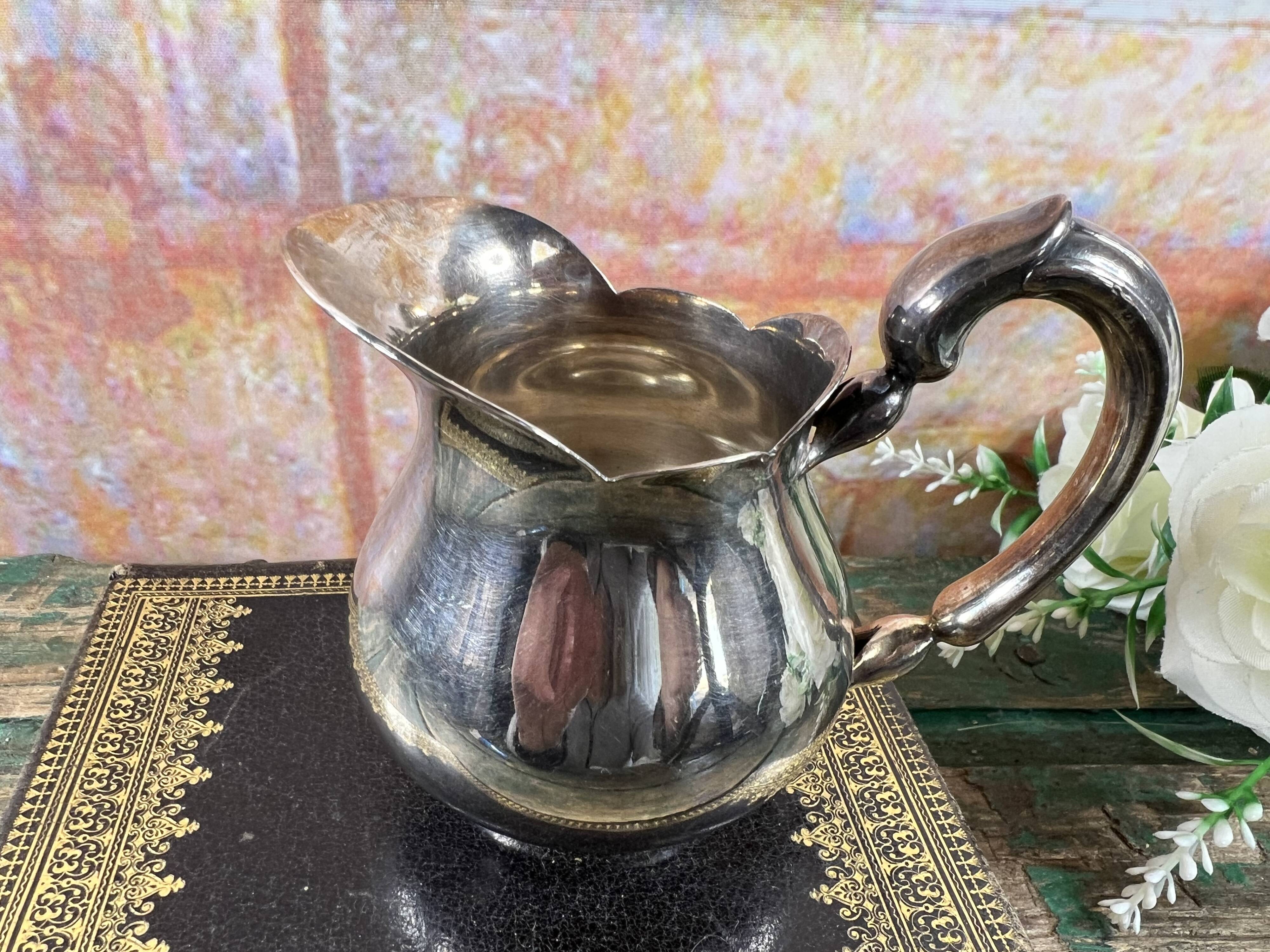Small Christofle silver-plated metal ewer – Baluster model – France, 20th century