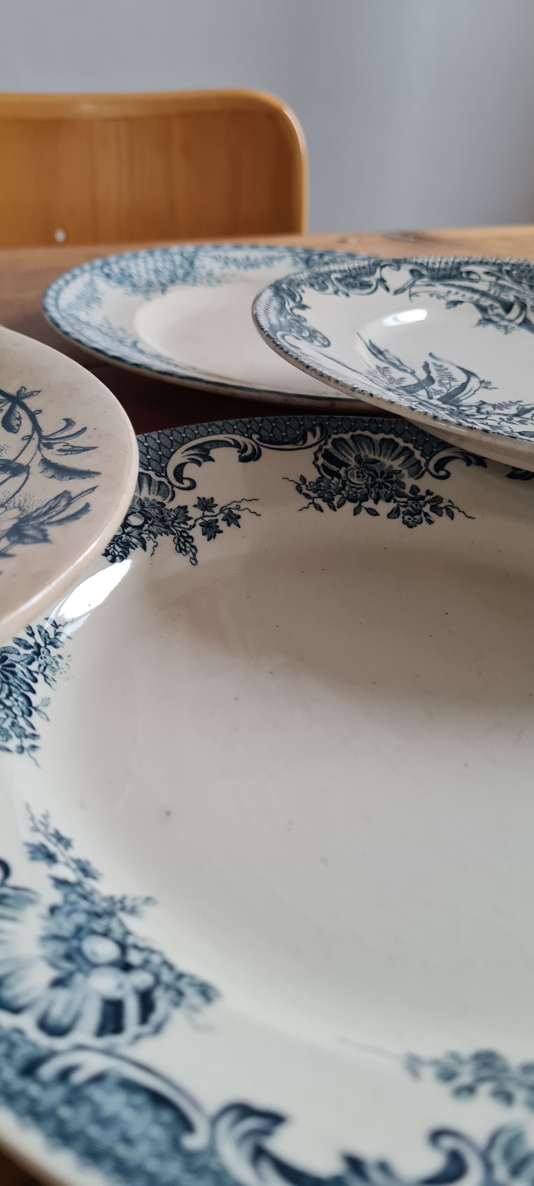 Set of 7 mismatched plates in iron earth