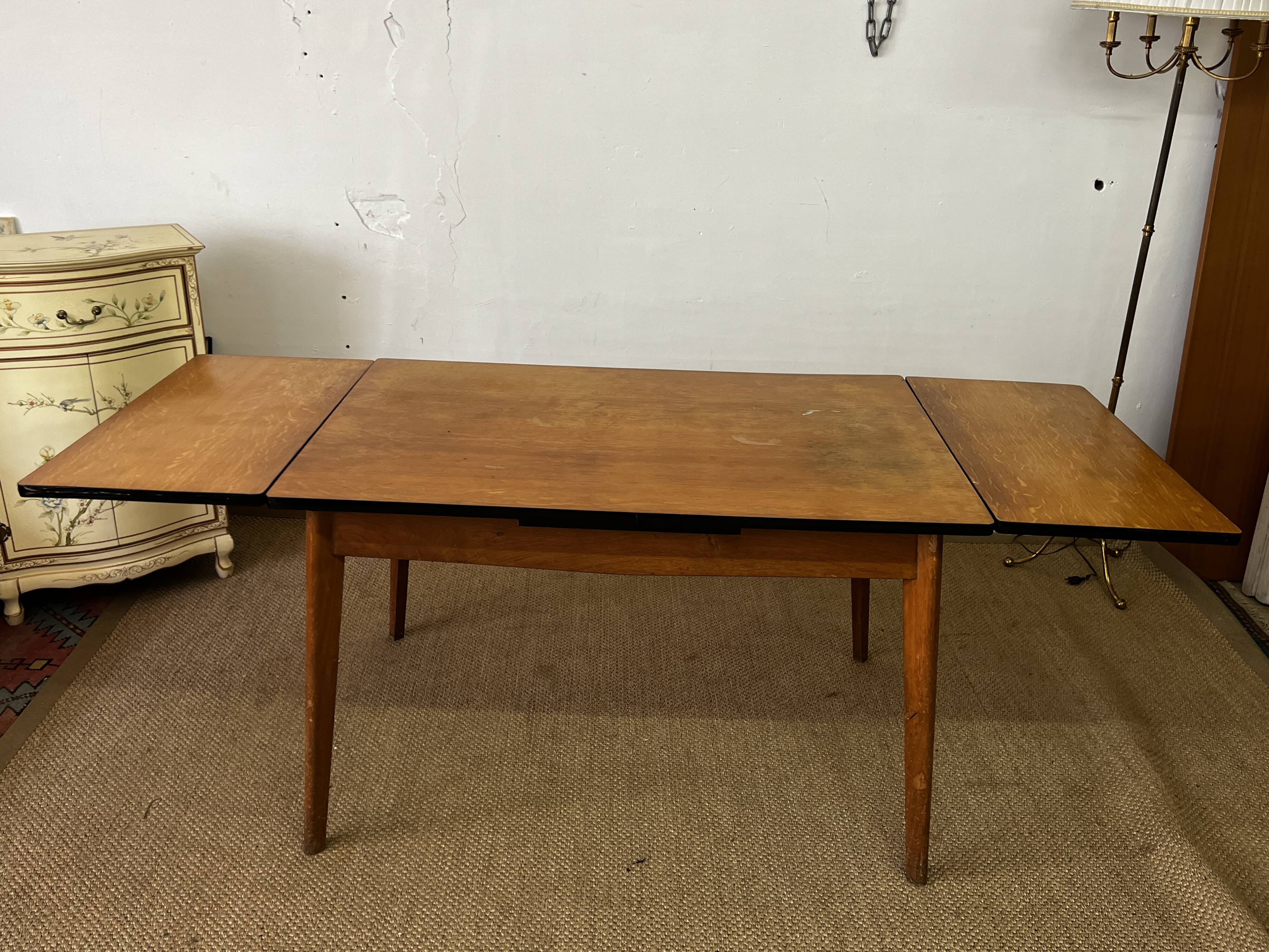 Vintage wooden table with extensions
