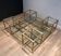 Important brass coffee table with multiple levels.