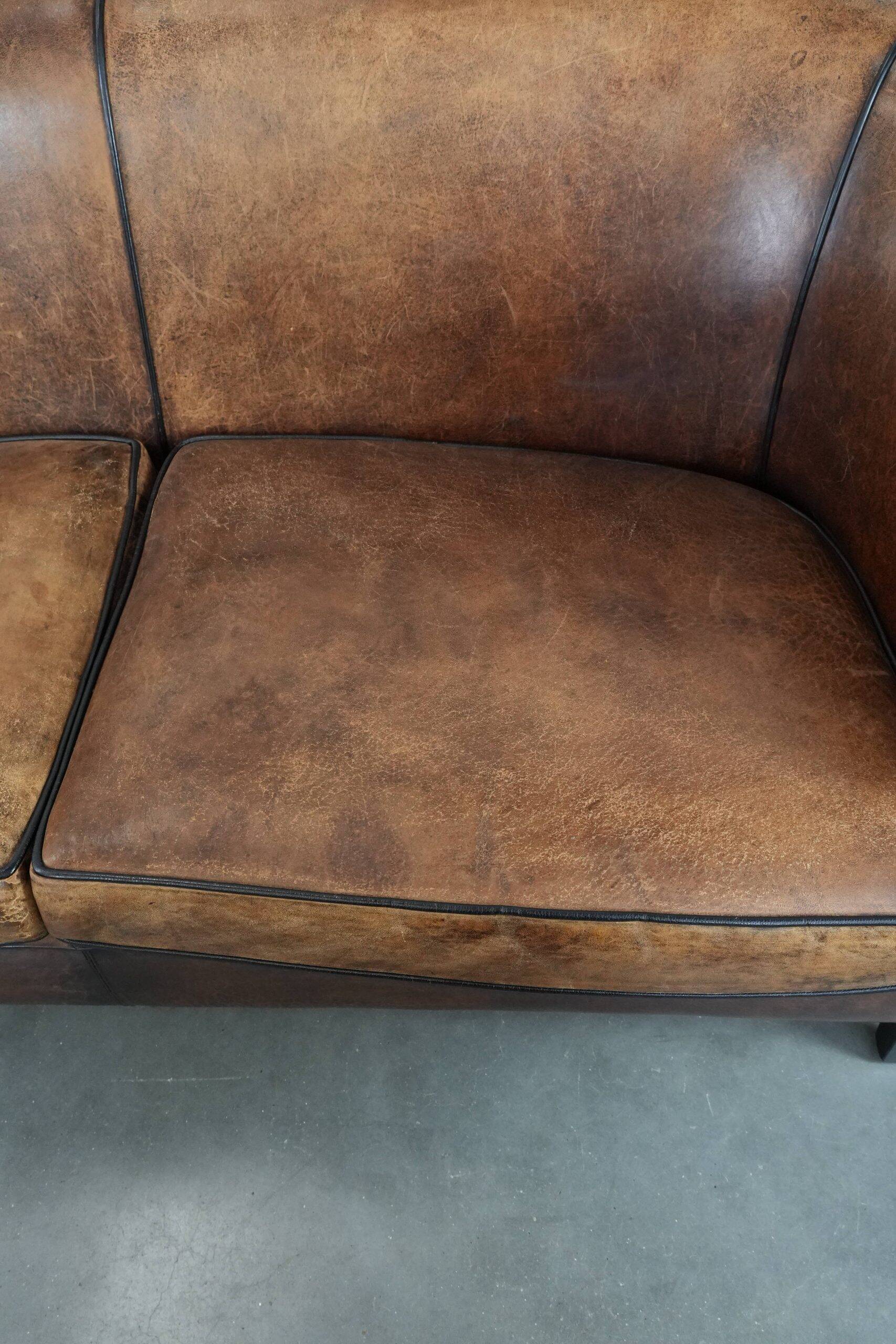 Comfortable vintage sheepskin 2.5-seater club sofa