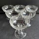 6 Baccarat champagne coupes with Greek engraving, slanted.