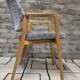 Vintage armchair from the 60s/70s in wood and grey fabric – with armrests.