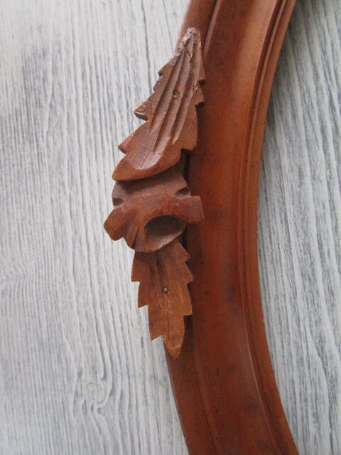 Old oval wooden frame