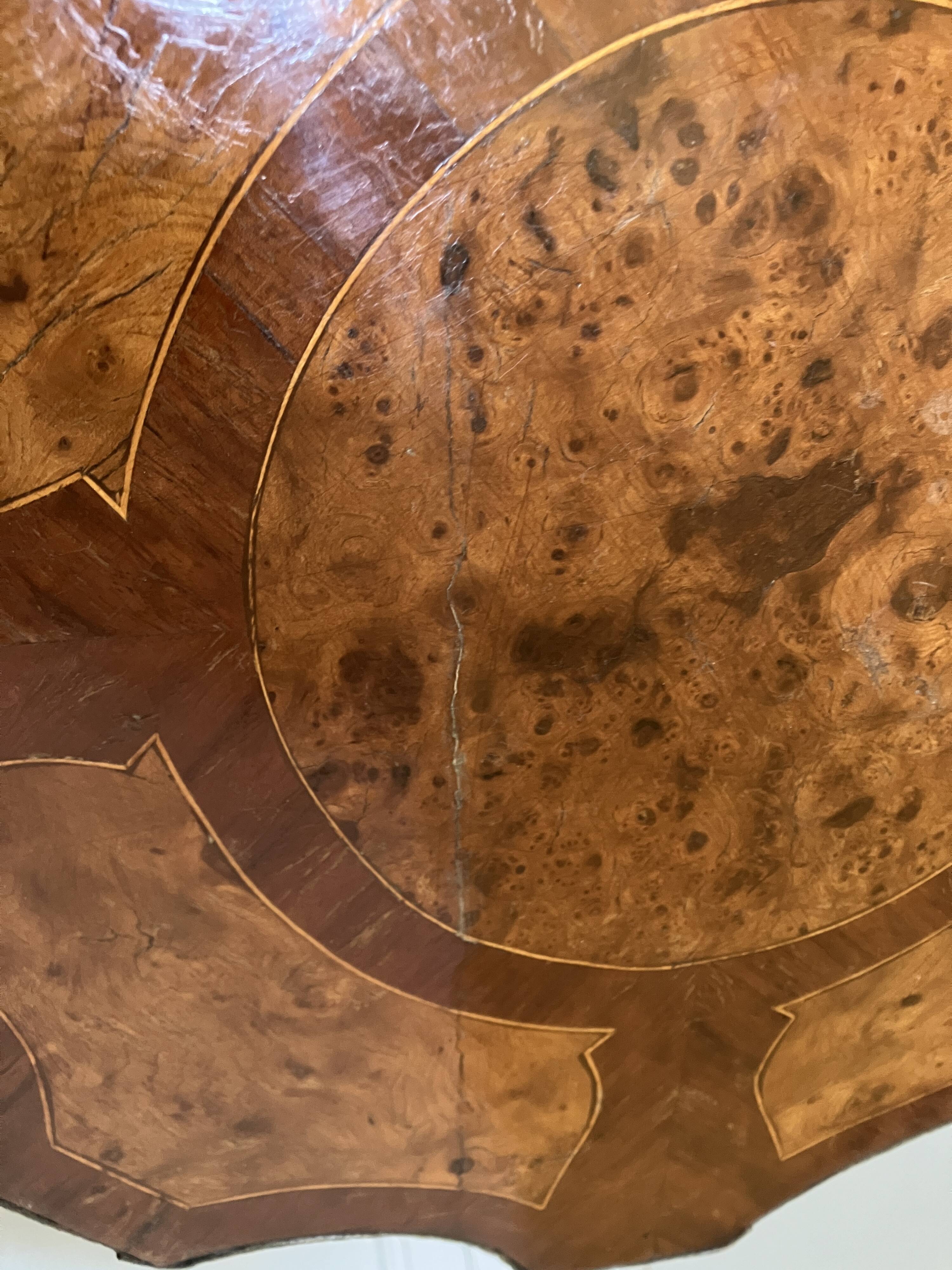 Marquetry pedestal table from the end of the 19th century