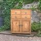 Parisian art deco sideboard in solid raw wood with pyrographed decorations, 1929