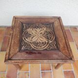 Table basse sculptée