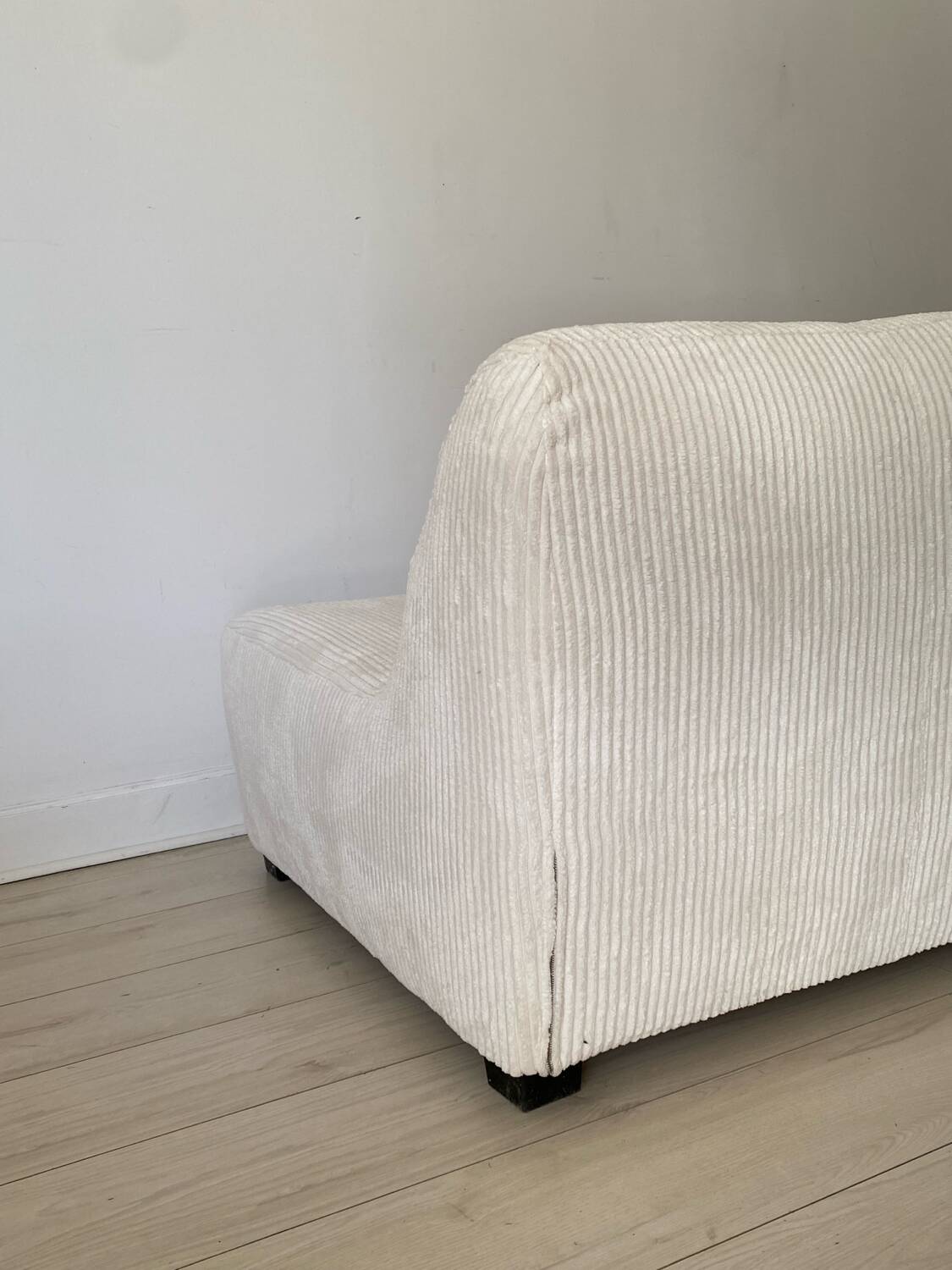 White corduroy armchair