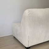 White corduroy armchair