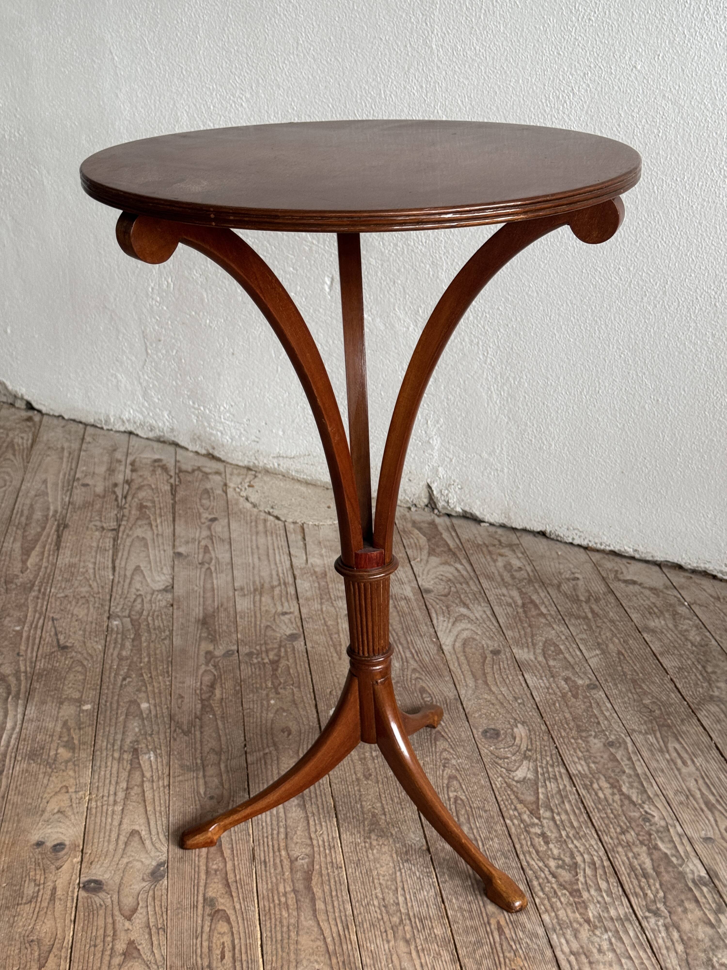Pair of victorian empire style mahogany tables, 20th century