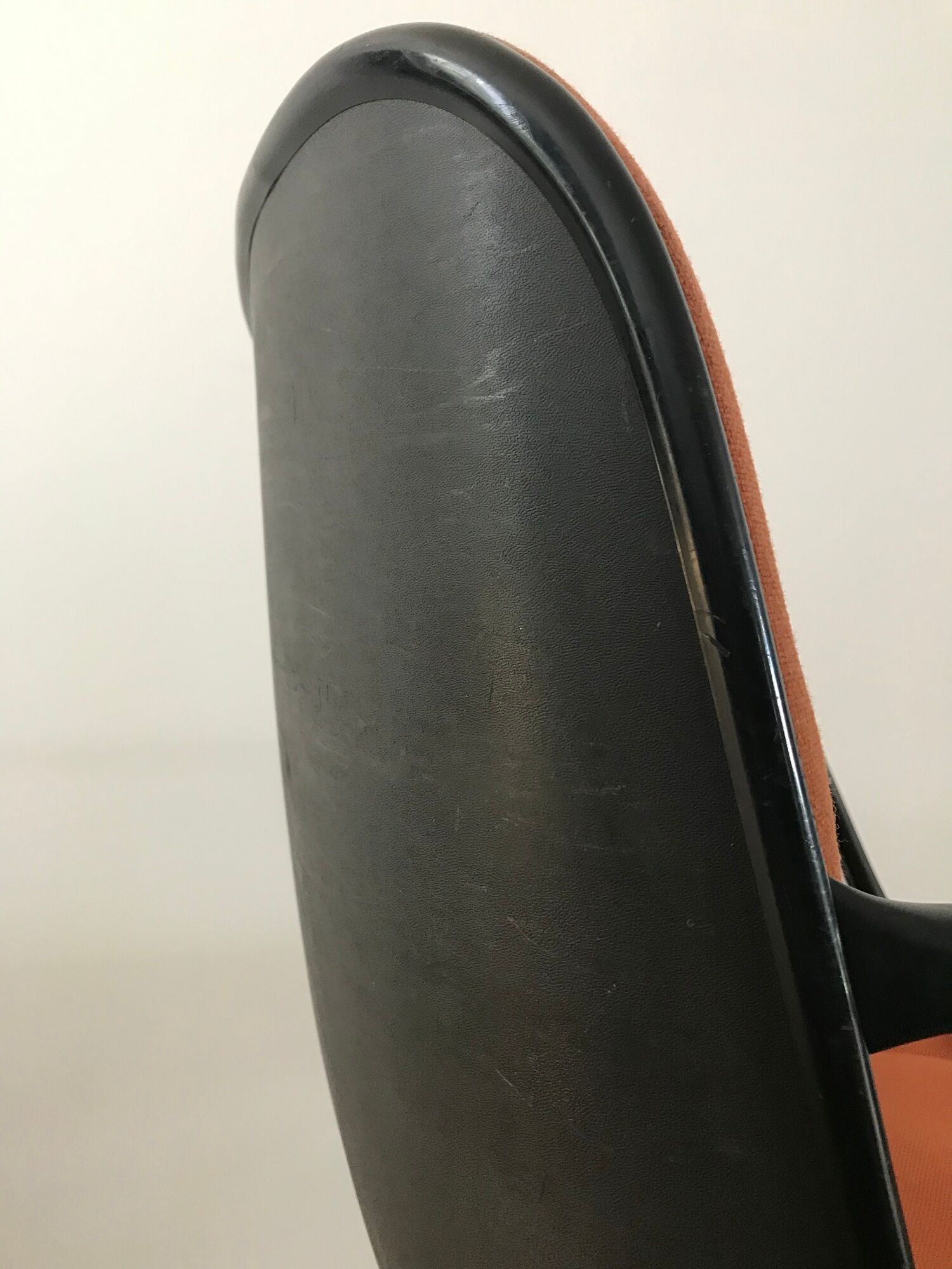Vintage orange armchair model 451 with wheels by Steelcase Strafor, design by Randall Buck