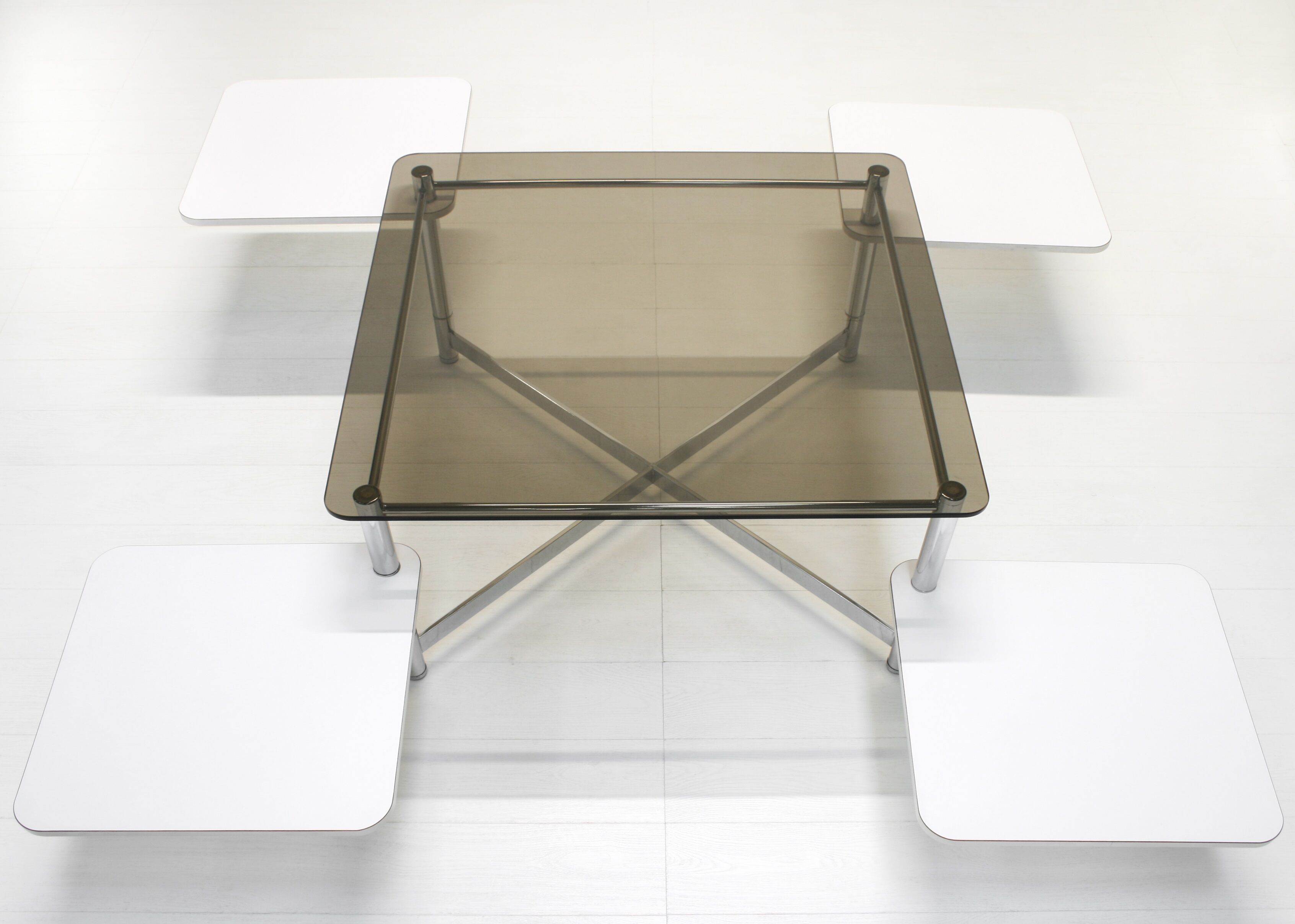 Vintage 1970s smoked glass swivel platform coffee table