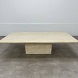 Rectangular travertine coffee table with central leg