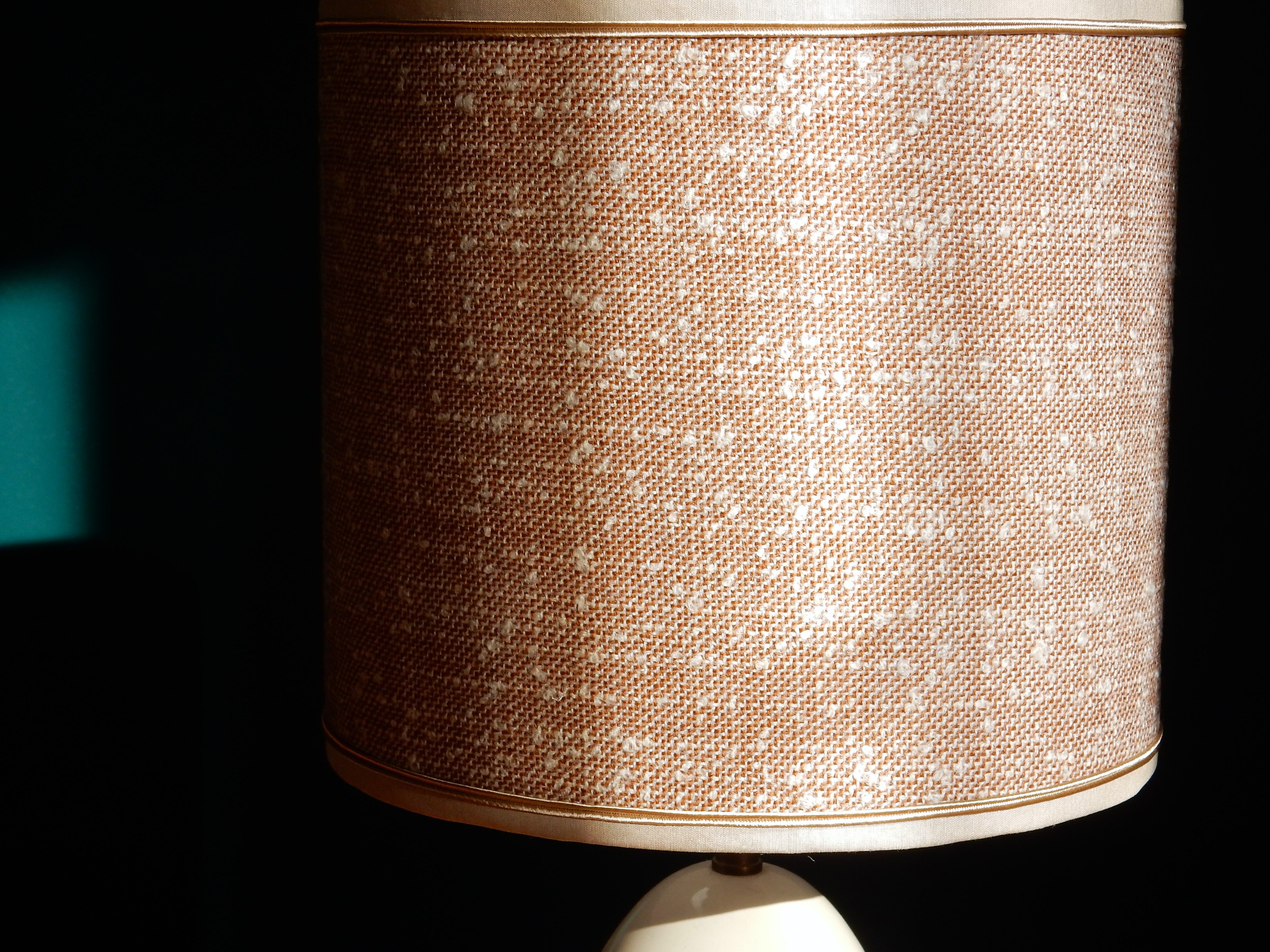 Table lamp in wool tweed and foot in cream color wood