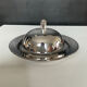 Vintage stainless steel and ceramic bell butter dish