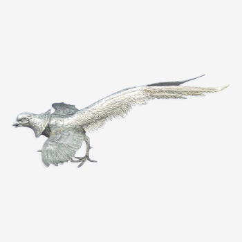 Flying animal made of silver metal