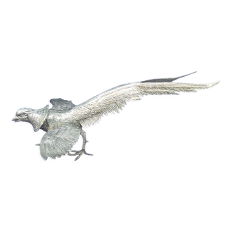Flying animal made of silver metal