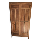 Antique Parisian wardrobe, dark wood storage furniture.