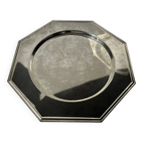 Many octagonal presentation plates in silver-plated metal.
