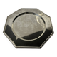 Many octagonal presentation plates in silver-plated metal.
