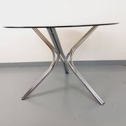 Vintage round dining table in smoked glass and chromed metal, Space Age style, from the 70s