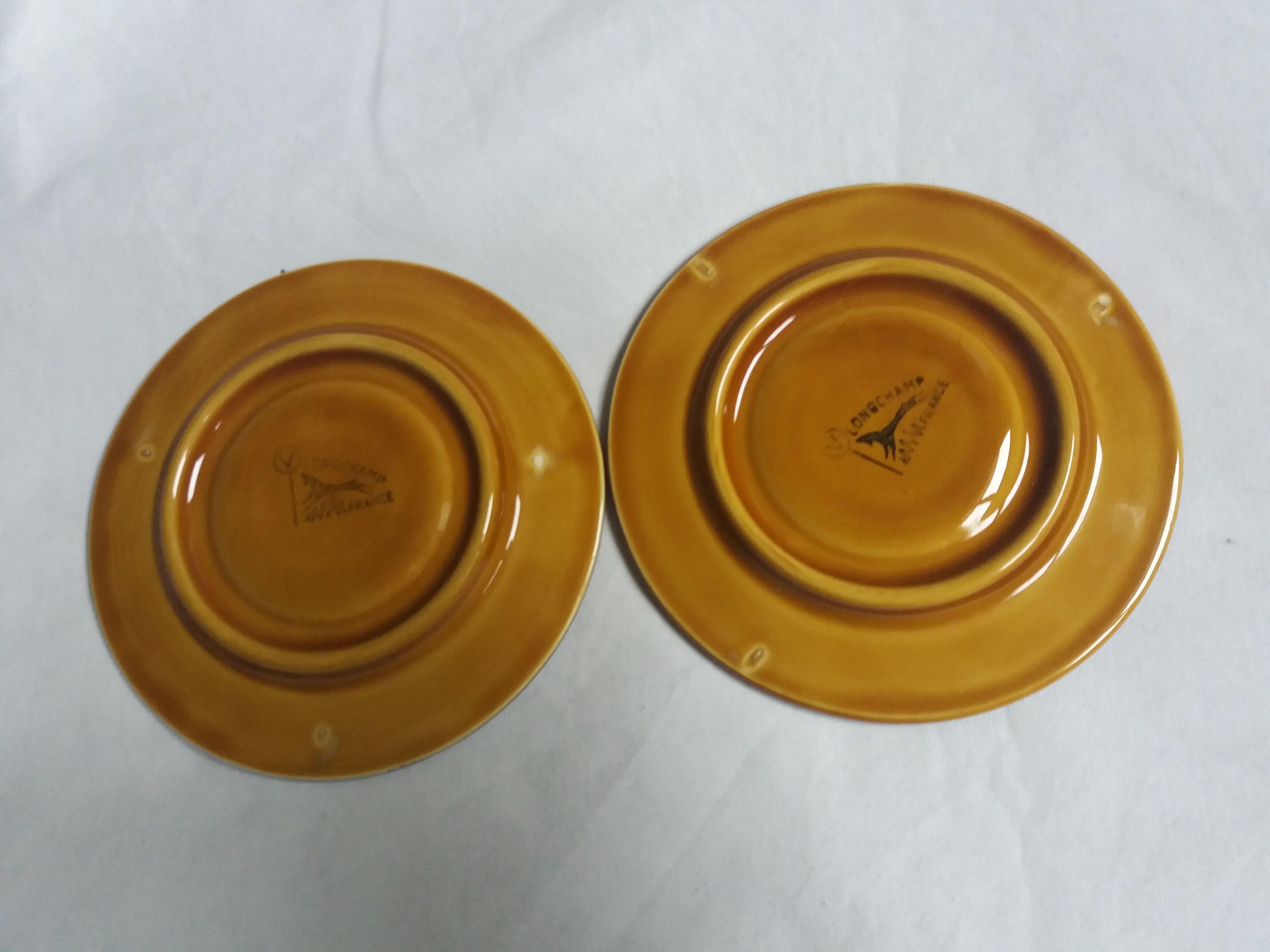 2 Longchamp ceramic coffee cups and saucers