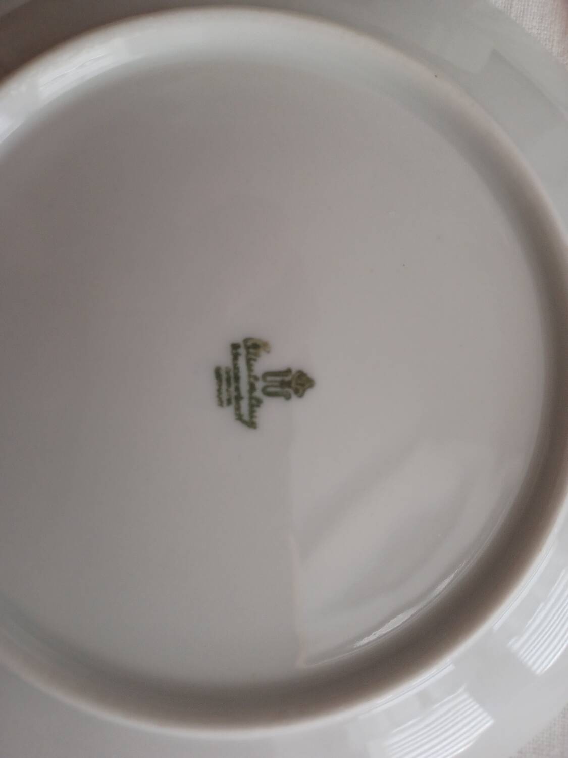 Vintage orange patterned cup and saucer