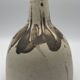 BOTTLE Vintage bottle in partially glazed pyrite stoneware