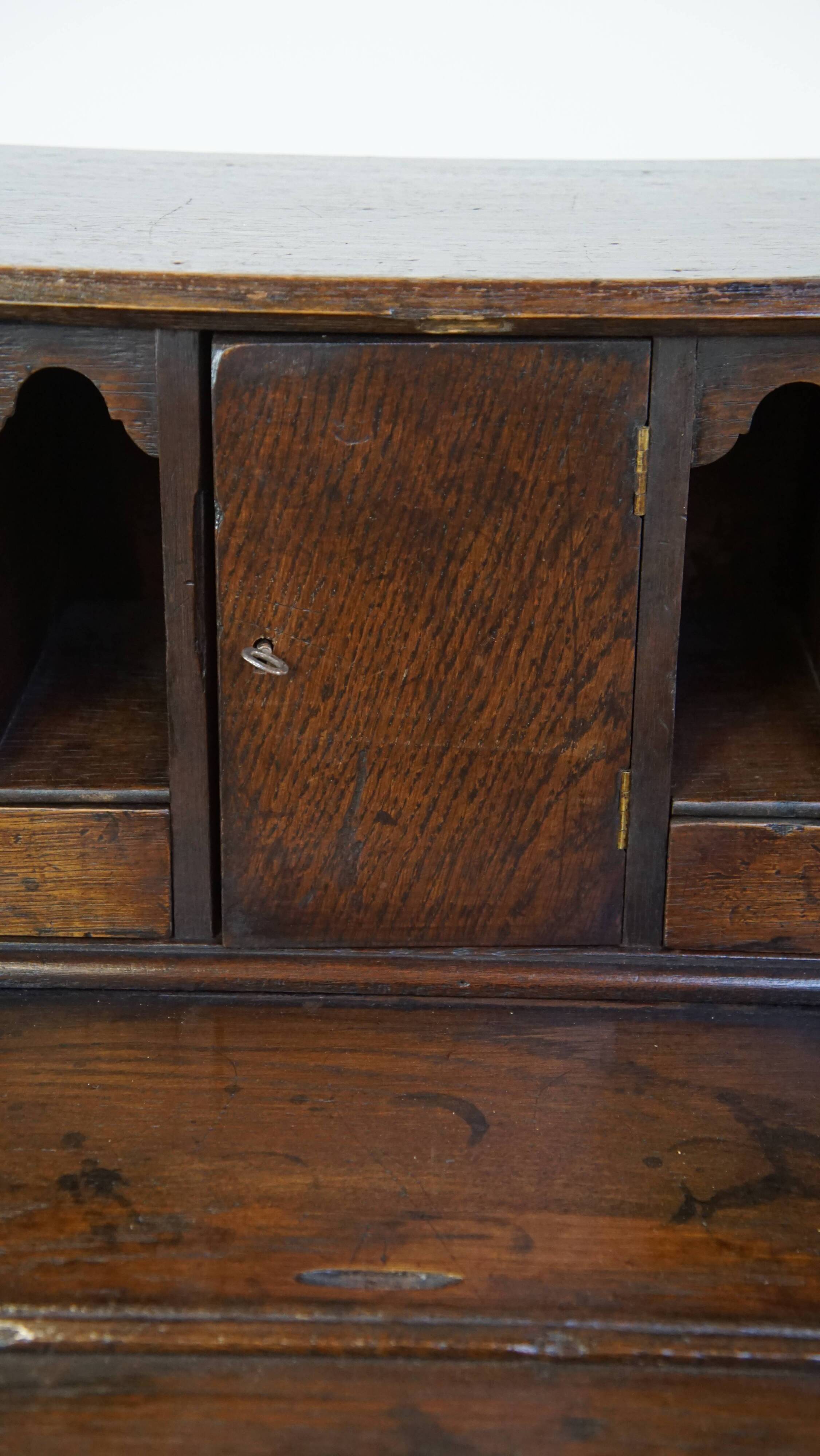 Antique subtle English secretaire from the early 19th century