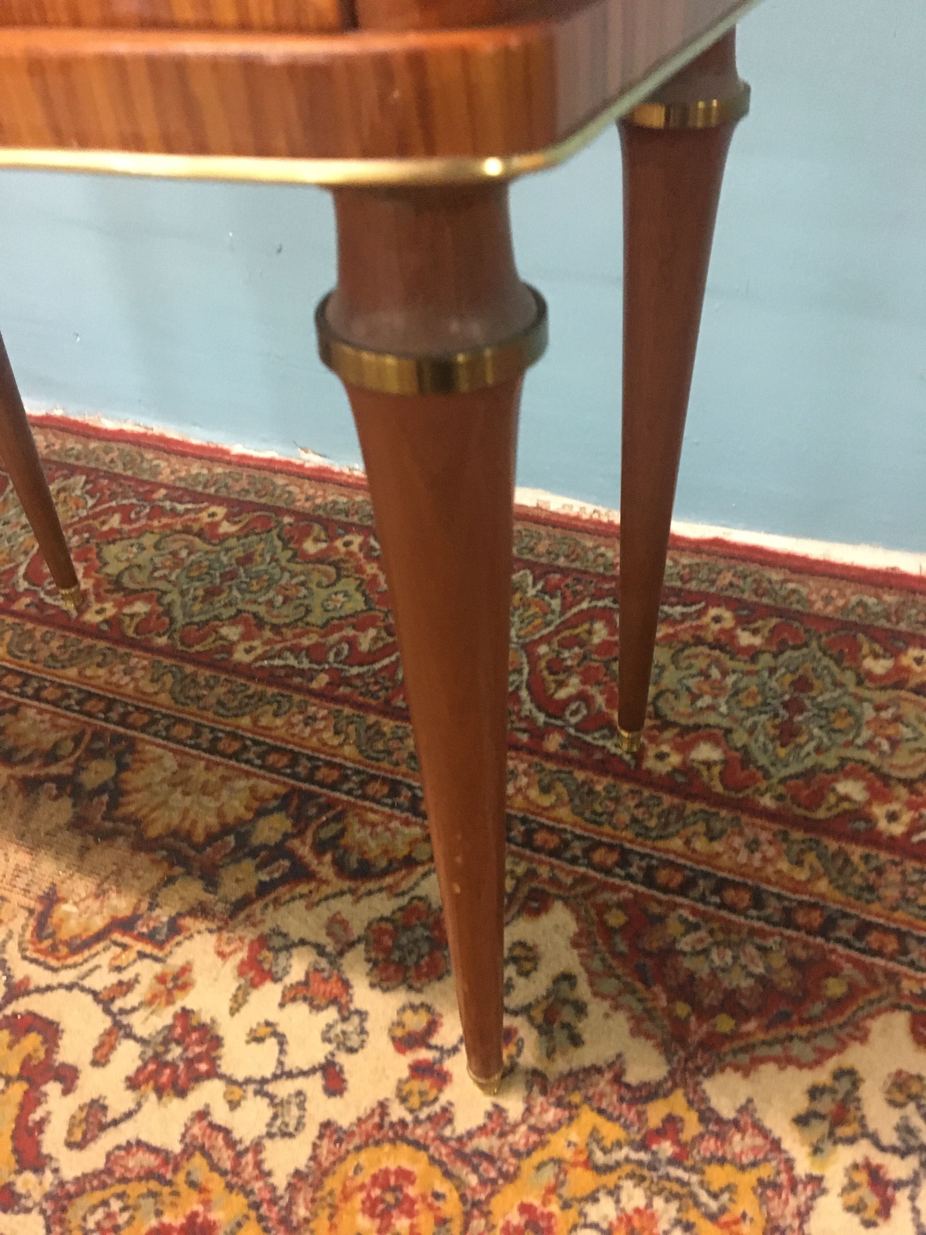 Pair of rosewood and brass bedsides circa 1950
