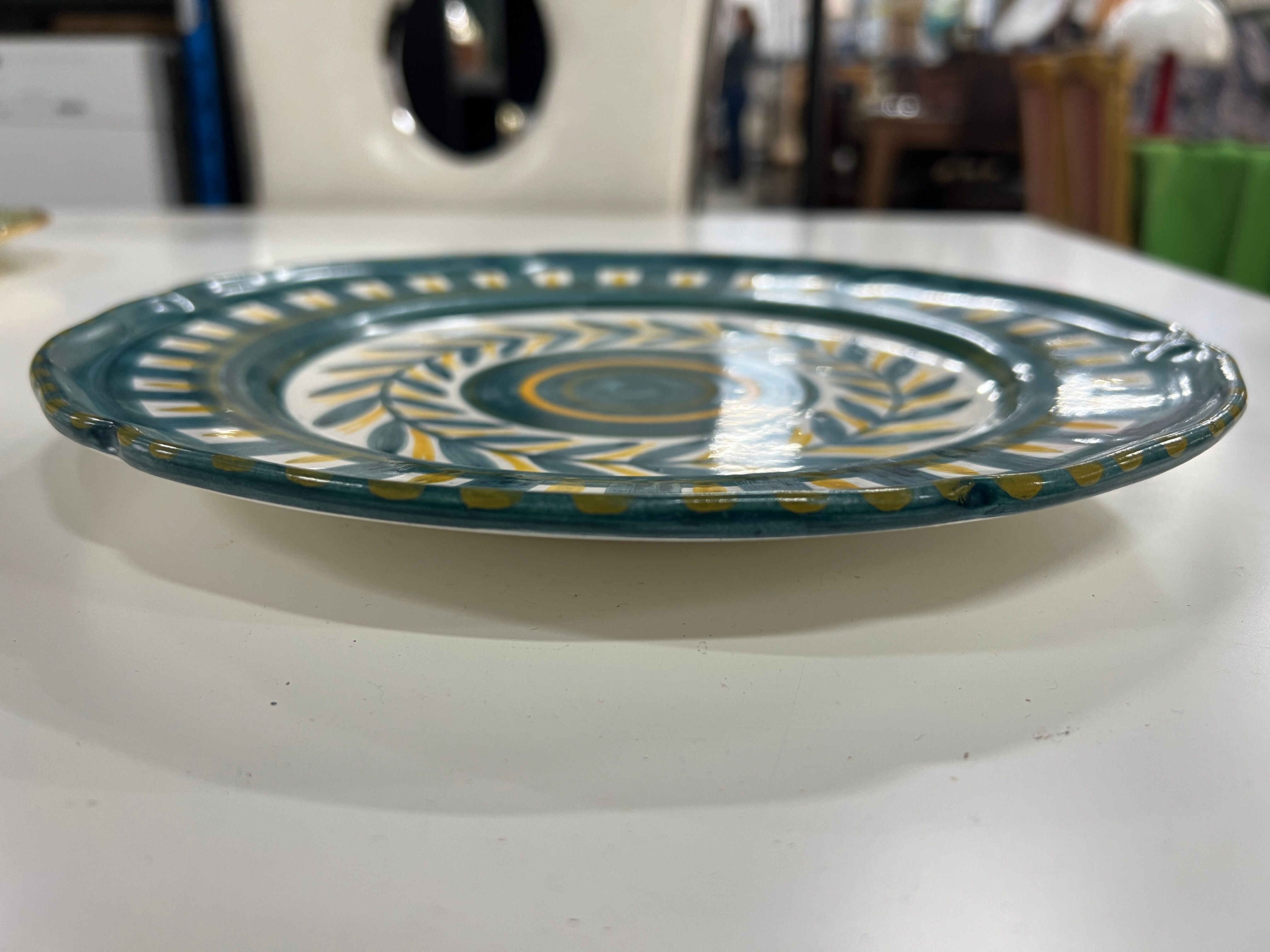 Painted and enamelled ceramic plate