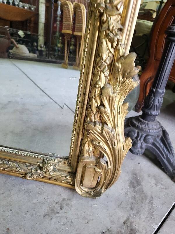 Large Louis XV gilded shell mirror from the 19th century