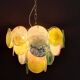 Handcrafted chandelier with Murano glass discs.