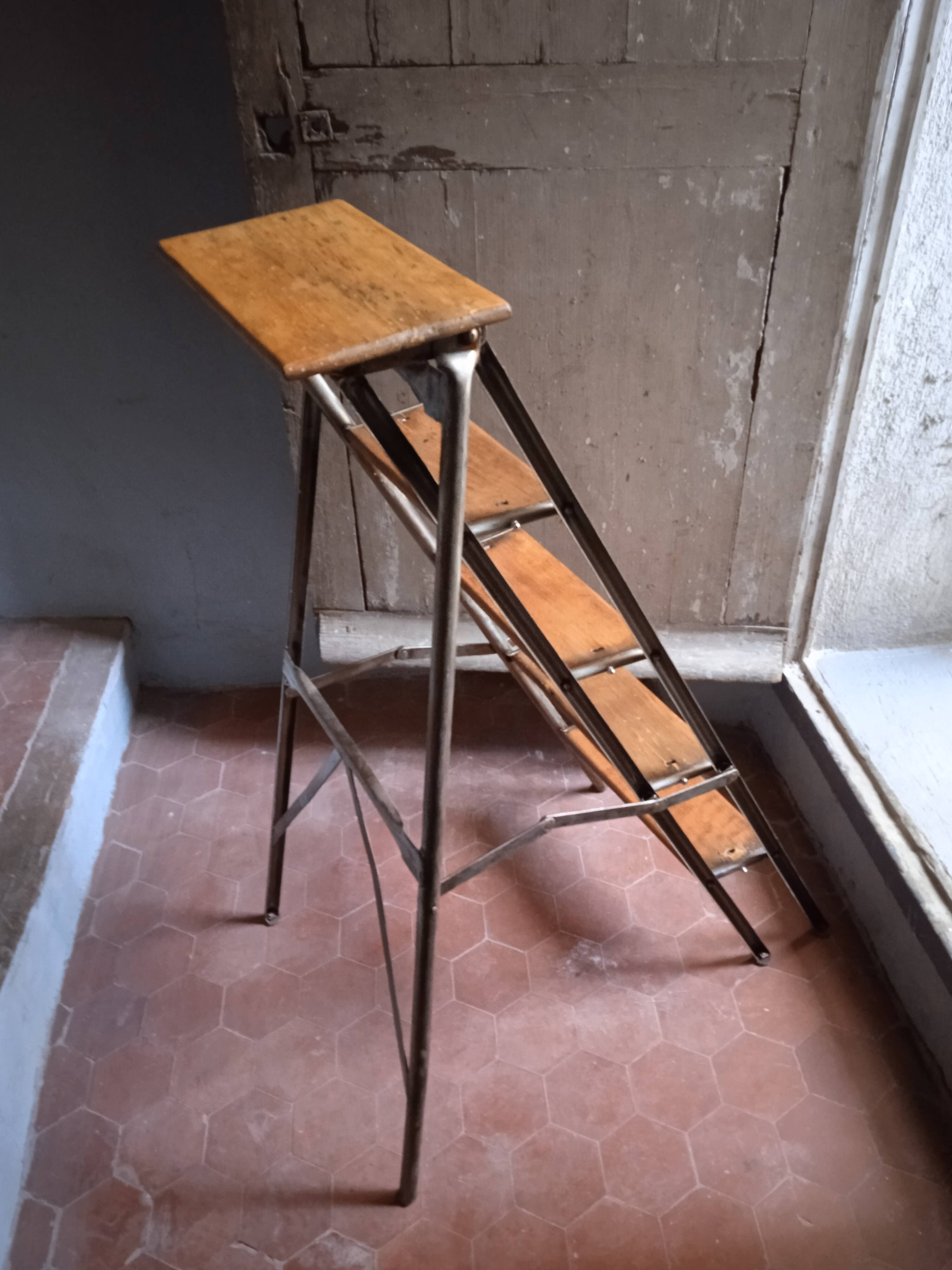 Vintage iron and wood stepladder with 5 steps